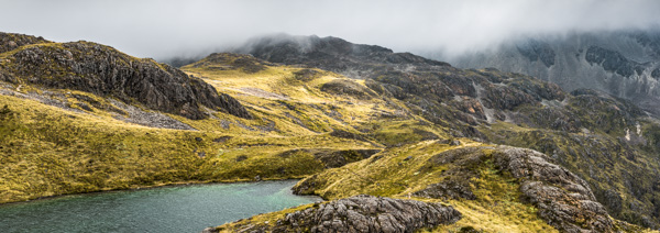 Alpine Tarn with Rocky Outcrops
